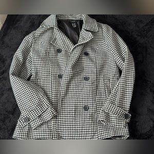 Houndstooth patterned coat
